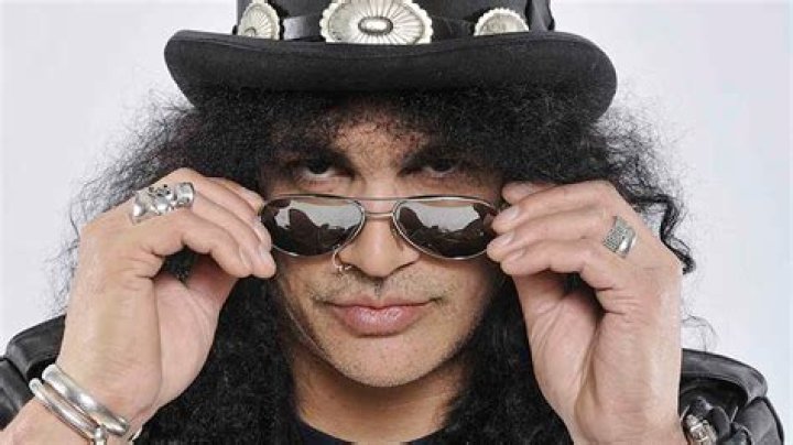 Slash Biography, Age, Height, Wife, Net Worth, Family
